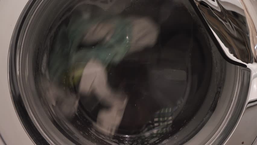 Washing machine, clothes washer inside the laundry room.