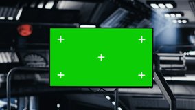 Chroma key monitor in space station surrounded by high tech equipment tracking analytics. Isolated screen display enabling real time mission control and spacecraft hardware troubleshooting - Powered by Shutterstock - Get 15% off with code: PIKWIZARD15