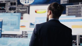 Data driven planning helps this professional to build a successful strategy for global business development. Using charts on dashboard and projections to guide his leadership ideas. Camera A. - Powered by Shutterstock - Get 15% off with code: PIKWIZARD15