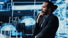 Tech savvy businessman employing AI brain data visualization, exploring algorithmic thinking and machine learning through neural networks system. Virtual intelligence in the digital age. Camera A. - Powered by Shutterstock - Get 15% off with code: PIKWIZARD15