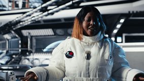 Joyous astronaut greeting command center researchers during videocall, presenting analysis findings. Smiling orbit station crew member provides scientific findings to Earth team, camera B - Powered by Shutterstock - Get 15% off with code: PIKWIZARD15