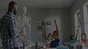 Teacher pointing skeleton after students raising hands, icons linking into class learning network. Education, classrooms, learning, collaboration, digital, connectivity, classroom - Powered by Shutterstock - Get 15% off with code: PIKWIZARD15