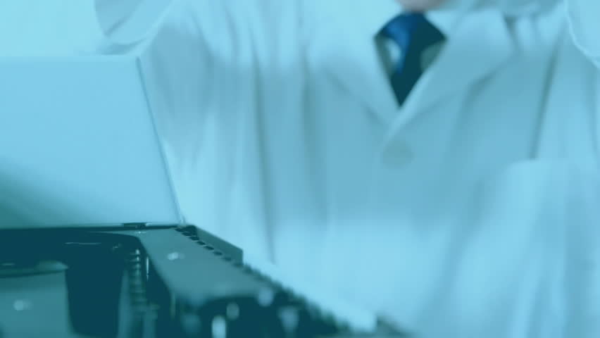 Senior scientist lifting yellow vial and inserting into instrument analyzing world map data overlay. Laboratory, research, technology, data, analysis, innovation, science - Powered by Shutterstock - Get 15% off with code: PIKWIZARD15