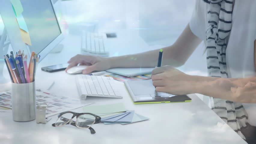 Designer tapping stylus on tablet initiating network map overlay showing user connections on screen. Creative, technology, workspace, digital, artistry, innovation, modern - Powered by Shutterstock - Get 15% off with code: PIKWIZARD15