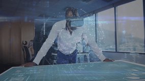 Man placing palms on glass table wearing VR, animating globe morphing into airplane for aviation. Virtual reality, holography, technology, digital interface, innovation, futuristic, professional - Powered by Shutterstock - Get 15% off with code: PIKWIZARD15