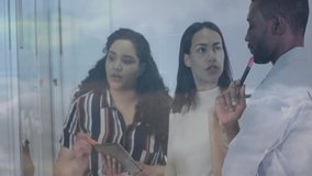 Three colleagues tapping tablet, writing on board, overlay network icons moving for business pitch. Collaboration, innovation, teamwork, data analysis, digital technology, modern office, strategic - Powered by Shutterstock - Get 15% off with code: PIKWIZARD15