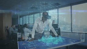 Tech VR user activating headset and leaning on table manipulating 3D cityscape reviewing plan. Futuristic, innovation, collaboration, digital, immersive, professional, smart - Powered by Shutterstock - Get 15% off with code: PIKWIZARD15