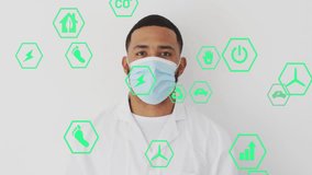 Medical professional holding mask at chest starting mask placing for health with eco icons floating. Sustainability, health, eco-friendly, clean innovation, futuristic, corporate, environmental - Powered by Shutterstock - Get 15% off with code: PIKWIZARD15