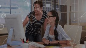 Designers analyzing data overlays and adjusting color palette on tablet for team design review. Collaboration, creative, modern, technology, team, workspace, innovation - Powered by Shutterstock - Get 15% off with code: PIKWIZARD15