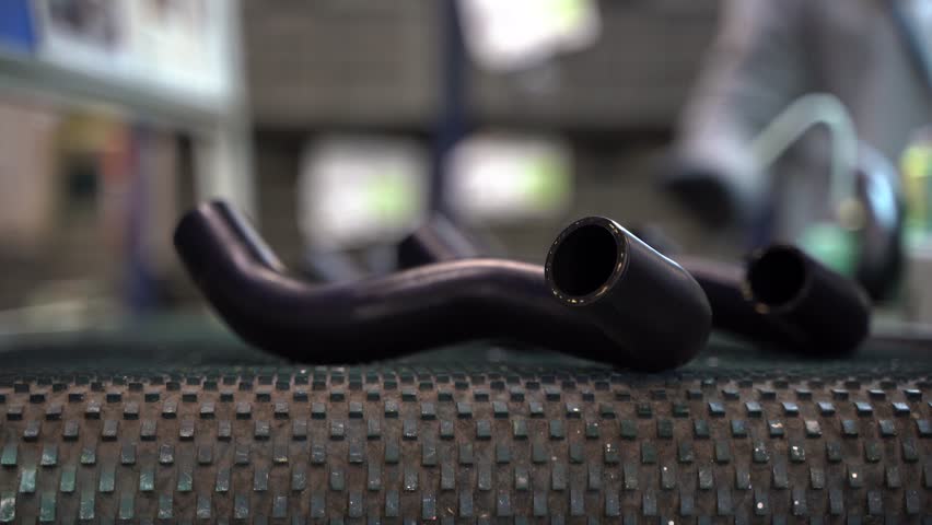 Radiator Hoses on the Production Line in a Car Engine Factory