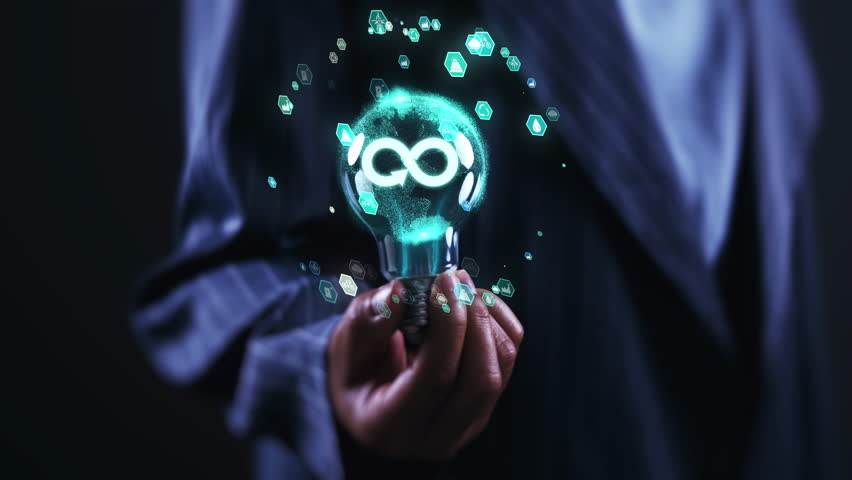 Sustainable Innovation concept. Businessperson holding a glowing infinity lightbulb, symbolizing sustainable innovation, circular economy, and eco-friendly business practices for a greener future.