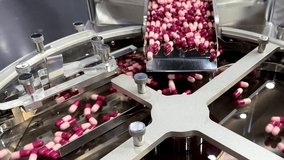 Medicine capsule pill in production line at medical factory, Industrial pharmaceutical concept.	 - Powered by Shutterstock - Get 15% off with code: PIKWIZARD15