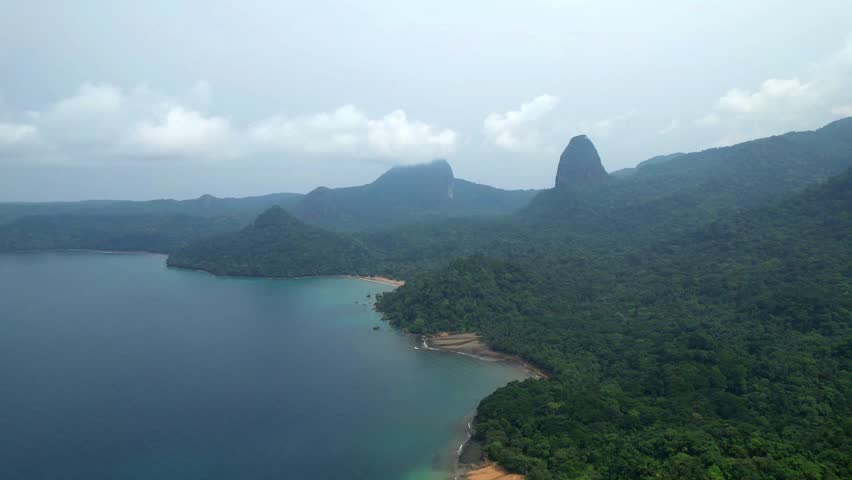 Aerial view over the coast of the Ilha do Principe (Prince Island) with the mountains at background,Africa