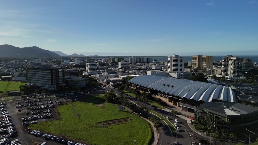 Cairns City Queensland Australia: 4K Aerial Drone Footage Featuring Coastal Marina, Buildings, Esplanade Hotels, Downtown Streets, Palm Lined Shoreline and the Coral Sea