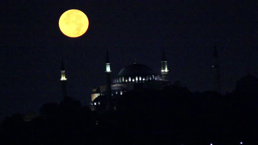 Ayasofya Majestic Mosque under a Full Moon at Night. A stunning nighttime hd video of a mosque, likely in Istanbul, Turkey, illuminated by the glow of the full moon. Hagia Sophia Mosque Ramadan islam