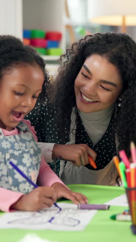 Happy teacher, girl and color with drawing in classroom for learning, education or fine motor skills. Educator, child or kid with smile for childhood development, creativity or fun activity at school