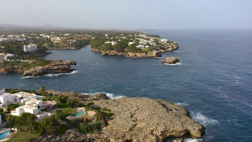Aerial viewof the beautiful Cala Ferrera and Cala D’or with villas, in the East side of Mallorca Island, Spain.