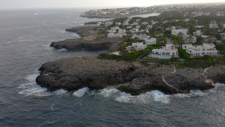 Aerial viewof the beautiful Cala Ferrera and Cala D’or with villas, in the East side of Mallorca Island, Spain.
