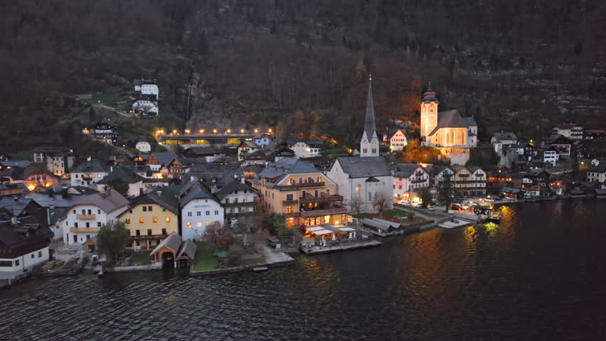 Night flight over of Hallstatt village in Salzkammergut, Upper Austria.