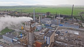 Greenhouse gas. Classic Industrial Pollution. smoke from the factory chimneys. concept of environmental pollution. Industrial landscape reveals smokestacks releasing emissions into the atmosphere - Powered by Shutterstock - Get 15% off with code: PIKWIZARD15