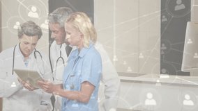 Nurse tapping tablet reviewing patient data as doctors pointing records with icon network appearing. Healthcare, collaboration, technology, medical team, digital interface, diagnostics, professional - Powered by Shutterstock - Get 15% off with code: PIKWIZARD15