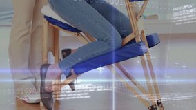 Woman settling onto chair and receiving therapist's rhythmic back massage with rising data overlays. Wellness, relaxation, therapy, digital, health, self-care, stress relief - Powered by Shutterstock - Get 15% off with code: PIKWIZARD15