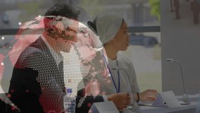 Two business experts at meeting initiating globe animation showing orbiting network links. Digital, communication, connectivity, collaboration, technology, strategic, professional - Powered by Shutterstock - Get 15% off with code: PIKWIZARD15