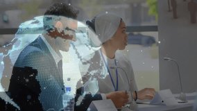 On speaker starting colleagues in meeting watching rotating globe driving business discussion. Globalization, networking, collaboration, innovation, professional, digital, modern - Powered by Shutterstock - Get 15% off with code: PIKWIZARD15