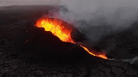 Incredible aerial of the dramatic volcanic eruption of the Litli Hrutur volcano eruption in Reykjanes peninsula Iceland. Flowing lava from the crater. Earthquakes. - Powered by Shutterstock - Get 15% off with code: PIKWIZARD15