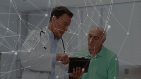 Male doctor tapping tablet and showing medical network overlay while explaining results to patient. Medical, technology, digital, healthcare, communication, collaboration, innovation - Powered by Shutterstock - Get 15% off with code: PIKWIZARD15
