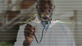 Senior doctor holding scope rotating while activating medical waveform overlay showing vital data. Health, diagnostics, technology, data visualization, clinical, professional, medical equipment - Powered by Shutterstock - Get 15% off with code: PIKWIZARD15