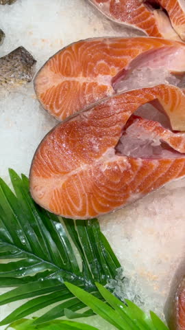 Fresh Salmon Steaks on Ice in a Store Display