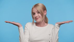 Woman comparing options with puzzled expression on blue - Powered by Shutterstock - Get 15% off with code: PIKWIZARD15