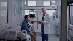 Doctor explaining the risks of leaving the hospital early as the patient prepares to sign an AMA form. - Powered by Shutterstock - Get 15% off with code: PIKWIZARD15