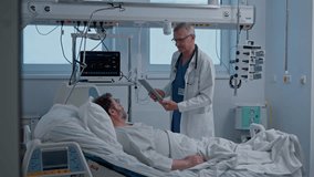 Doctor examining the patient in bed. Medical procedure. - Powered by Shutterstock - Get 15% off with code: PIKWIZARD15