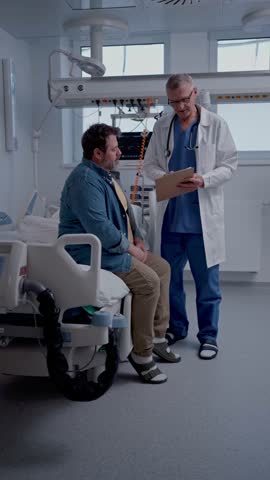 Doctor explaining the risks of leaving the hospital early as the patient prepares to sign an AMA form.