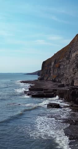Dramatic Rock Cliffs at Dunraven Bay, Bridgend – Scenic Welsh Coastline in the UK | 4K Vertical Nature Video