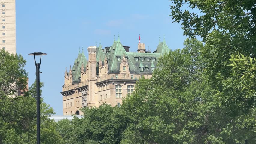 Viewing deck at the Forks in Winnipeg, view of Fort Garry Hotel, Portage and Main, Museum for human rights and winnipeg skyline in summer