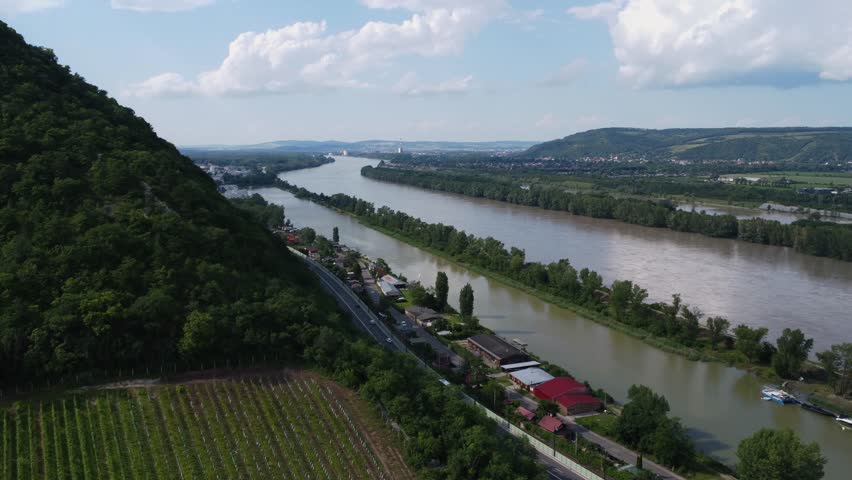 Beautiful Landscape of Vienna with River Danube and Hills from Above. Peaceful River and Hill Landscape in Austria. Travel Footage