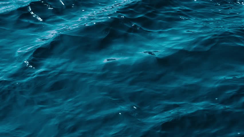 Slow motion voyage across green oceans slow motion cinematic 4K B-ROLL footage under serene twilight veil perfect for mobile devices, desktop backgrounds, creative marketing designs and nature lovers. Sublime aquatic scene captures ethereal water surface with atmospheric lighting and tranquil oceanic movement in stunning detail. Peaceful seascape reveals mesmerizing wave patterns and calming color gradients creating meditative natural beauty. Premium cinematic quality delivers soothing visual experience perfect for advertising, marketing campaigns, branding projects, social media content, nature documentaries, wellness applications, digital backgrounds, corporate presentations, and creative editorial projects requiring tranquil water imagery.