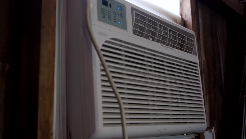 View of the Window Air Conditioner to Keep the Home Cool. 