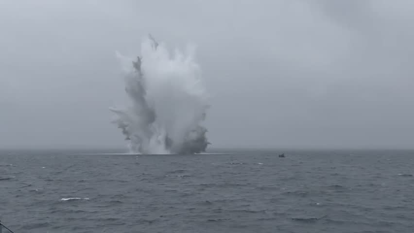 Massive mine explosion in the middle of the sea.