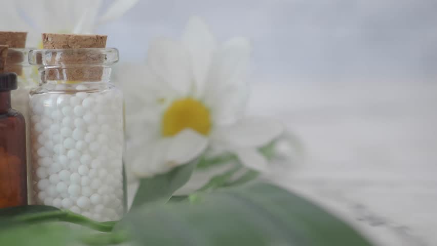 Homeopathy alternative medicine in a glass jar 