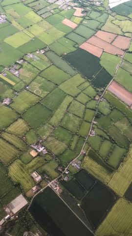 Aerial View of Green Farmland Patchwork Near Dublin, Ireland – Scenic Rural Landscape from Above, Irish Countryside, Colorful Fields and Farms