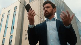Caucasian middle-aged businessman adult business man male guy entrepreneur angry irritated trying call with mobile phone failure connection error Wi-Fi lost broken smartphone bad signal in sunny city - Powered by Shutterstock - Get 15% off with code: PIKWIZARD15
