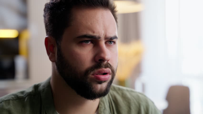 Dreaming adult pondering Caucasian business man bearded male guy client businessman homeowner looking distance thinking imagination shaking head no unwell ill headache bad decision at home living room