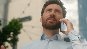 Successful worker adult Caucasian businessman employer 40s trader urban developer business man male manager banker middle-aged talking mobile phone negotiate call smartphone in city sunny guy sun - Powered by Shutterstock - Get 15% off with code: PIKWIZARD15