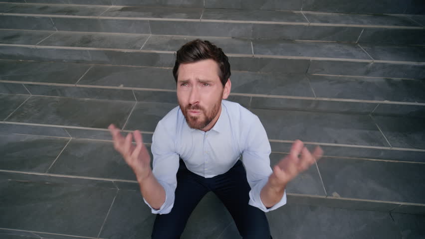 Stressed upset suffering middle-aged man sad male talking yelling to God heaven hope faith praying work problem bankruptcy mature businessman lost job business dismissed unemployment fired in city