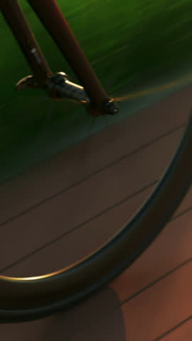 Bike wheel rotation in sunset light. Woman is riding bike at sunrise. Cyclist cycling on bicycle on cycle path at sunset. Cycling gear, chain and cassette, close up. Vertical video