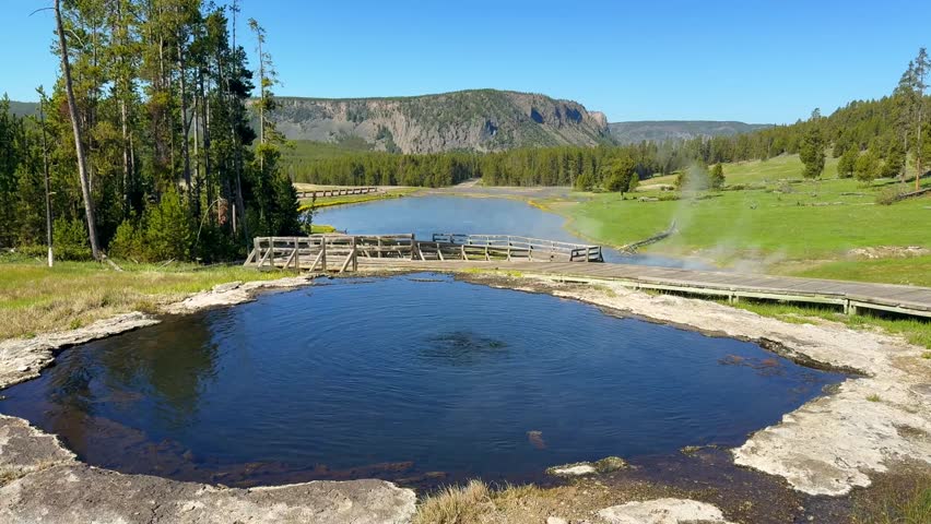Pool of boiling water from a bubbling hot spring at the Terrace Springs in Yellowstone National Park